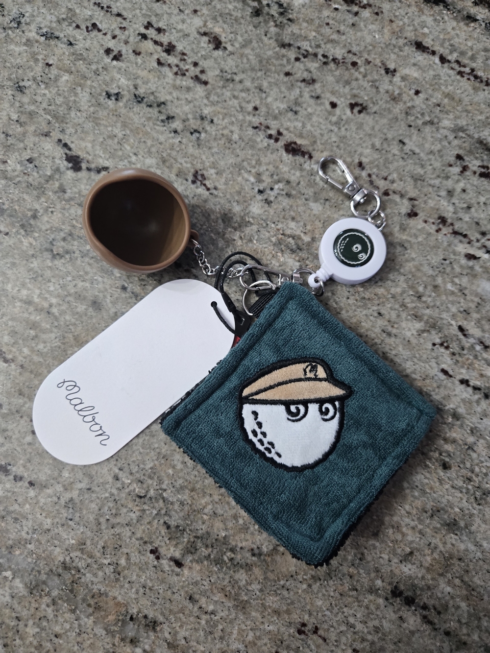 Malbon Golf Ball holder and towel